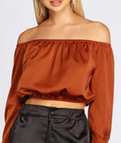 With fun and flirty details, She's A Romantic Satin Off-Shoulder Blouse shows off your unique style for a trendy outfit for the summer season!