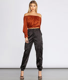 With fun and flirty details, She's A Romantic Satin Off-Shoulder Blouse shows off your unique style for a trendy outfit for the summer season!