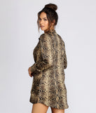 With fun and flirty details, Snake Print Tie Front Tunic shows off your unique style for a trendy outfit for the summer season!