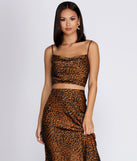 You’ll look stunning in the Leopard Cowl Neck Crop Top when paired with its matching separate to create a glam clothing set perfect for a New Year’s Eve Party Outfit or Holiday Outfit for any event!