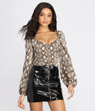 With fun and flirty details, Chic Satin Snake Print Top shows off your unique style for a trendy outfit for the summer season!