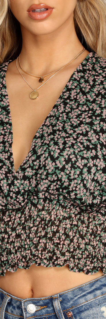 With fun and flirty details, Darling Ditzy Floral Smocked Top shows off your unique style for a trendy outfit for the summer season!