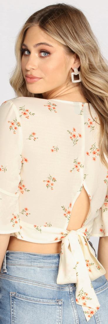With fun and flirty details, Ditsy Floral Wrap Front Top shows off your unique style for a trendy outfit for the summer season!