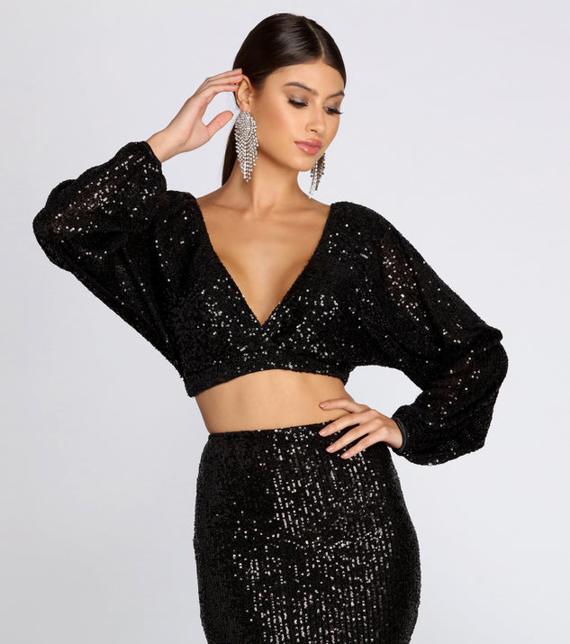 You’ll look stunning in the Own The Night Sequin Crop Top when paired with its matching separate to create a glam clothing set perfect for parties, date nights, concert outfits, back-to-school attire, or for any summer event!