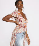 With fun and flirty details, Floral Fusion Chiffon High Low Top shows off your unique style for a trendy outfit for the summer season!