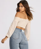 With fun and flirty details, Frilled and Flirty Off The Shoulder Smocked Crop Top shows off your unique style for a trendy outfit for the summer season!