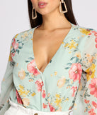 With fun and flirty details, Poised In Petals Floral Chiffon Bodysuit shows off your unique style for a trendy outfit for the summer season!