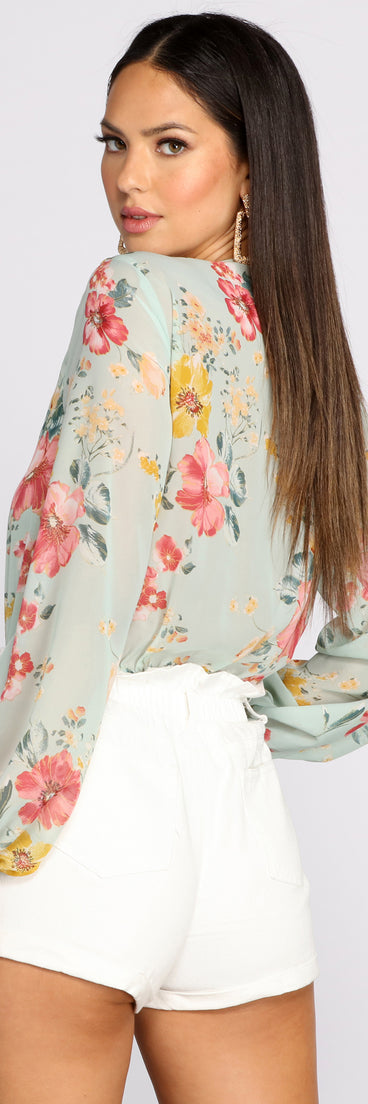 With fun and flirty details, Poised In Petals Floral Chiffon Bodysuit shows off your unique style for a trendy outfit for the summer season!