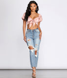With fun and flirty details, Feelin' Sassy Satin Crop Top shows off your unique style for a trendy outfit for the summer season!