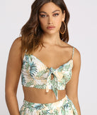 With fun and flirty details, Tropical Babe Tie Front Gauze Crop Top shows off your unique style for a trendy outfit for the summer season!