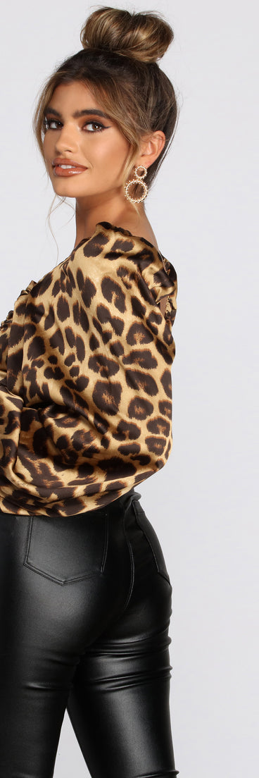 With fun and flirty details, Tie Front Leopard Print Satin Blouse shows off your unique style for a trendy outfit for the summer season!