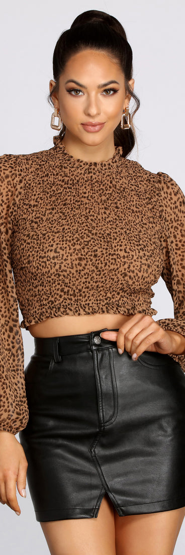 With fun and flirty details, Smocked And Spotted Crop Top shows off your unique style for a trendy outfit for the summer season!