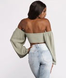 With fun and flirty details, Long Sleeve Gauze Tie Front Crop Top shows off your unique style for a trendy outfit for the summer season!