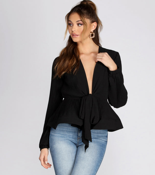 With fun and flirty details, Bring The Drama Peplum Top shows off your unique style for a trendy outfit for the summer season!