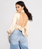 With fun and flirty details, Sweet Moments Satin Mock Neck Blouse shows off your unique style for a trendy outfit for the summer season!