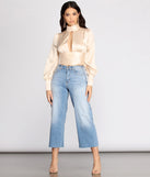 With fun and flirty details, Sweet Moments Satin Mock Neck Blouse shows off your unique style for a trendy outfit for the summer season!