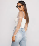 With fun and flirty details, Statement Stunner Smocked Puff Sleeve Crop Top shows off your unique style for a trendy outfit for the summer season!