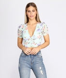 With fun and flirty details, In Bloom Floral Crop Top shows off your unique style for a trendy outfit for the summer season!