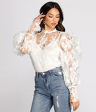 With fun and flirty details, Power Shoulders Puff Embroidered Top shows off your unique style for a trendy outfit for the summer season!