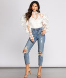 With fun and flirty details, Power Shoulders Puff Embroidered Top shows off your unique style for a trendy outfit for the summer season!