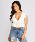 With fun and flirty details, Effortlessly Chic Ruffle Hem Gauze Crop Top shows off your unique style for a trendy outfit for the summer season!