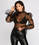 With fun and flirty details, Playin' Games Puff Sleeve Top + Bralette shows off your unique style for a trendy outfit for the summer season!