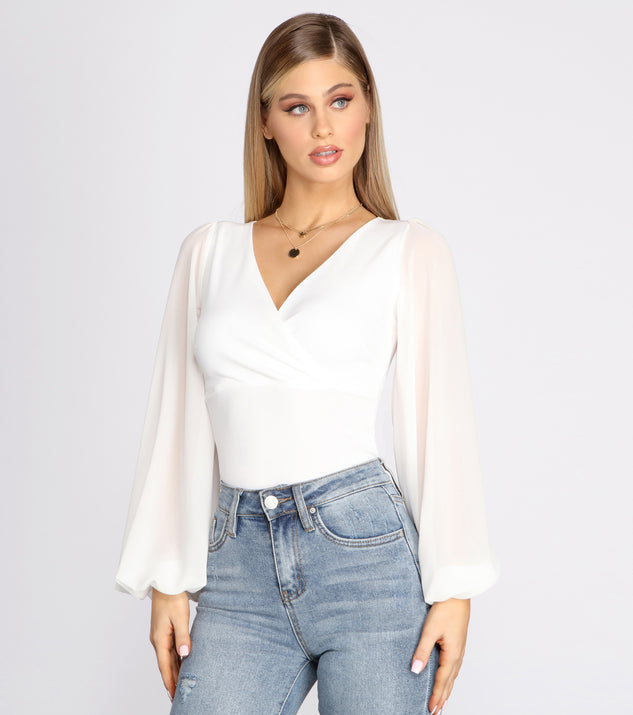 With fun and flirty details, Classic Chiffon Sleeve Wrap Front Blouse shows off your unique style for a trendy outfit for the summer season!