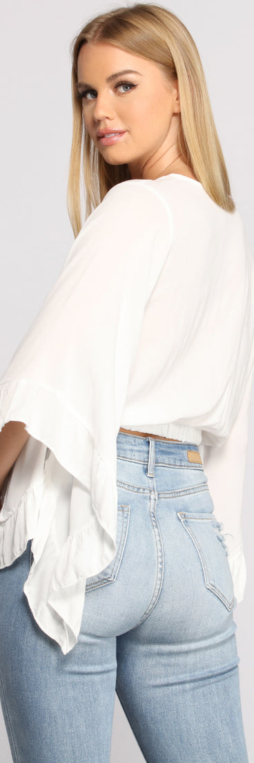 With fun and flirty details, Bohemian Babe Cropped Ruffled Sleeve Top shows off your unique style for a trendy outfit for the summer season!