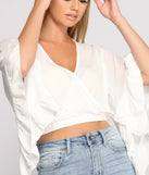 With fun and flirty details, Bohemian Babe Cropped Ruffled Sleeve Top shows off your unique style for a trendy outfit for the summer season!
