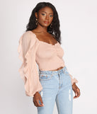 With fun and flirty details, Ruffle Tease Smocked Crop Top shows off your unique style for a trendy outfit for the summer season!