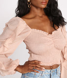 With fun and flirty details, Ruffle Tease Smocked Crop Top shows off your unique style for a trendy outfit for the summer season!