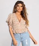 With fun and flirty details, Flutter Some Hearts Floral Crop Top shows off your unique style for a trendy outfit for the summer season!