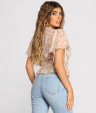 With fun and flirty details, Flutter Some Hearts Floral Crop Top shows off your unique style for a trendy outfit for the summer season!