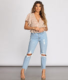 With fun and flirty details, Flutter Some Hearts Floral Crop Top shows off your unique style for a trendy outfit for the summer season!