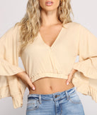 With fun and flirty details, Bohemian Vibes Cropped Ruffled Sleeve Top shows off your unique style for a trendy outfit for the summer season!