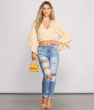With fun and flirty details, Bohemian Vibes Cropped Ruffled Sleeve Top shows off your unique style for a trendy outfit for the summer season!