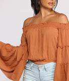 With fun and flirty details, Flowy Feels Off The Shoulder Crop Top shows off your unique style for a trendy outfit for the summer season!