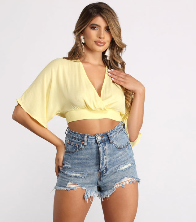 With fun and flirty details, Plunging Surplice Tie Back Gauze Crop Top shows off your unique style for a trendy outfit for the summer season!