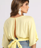 With fun and flirty details, Plunging Surplice Tie Back Gauze Crop Top shows off your unique style for a trendy outfit for the summer season!