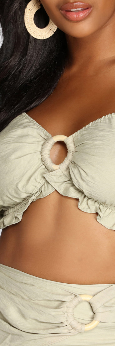 You’ll look stunning in the Endless Summer O-Ring Ruffle Hem Crop Top when paired with its matching separate to create a glam clothing set perfect for a New Year’s Eve Party Outfit or Holiday Outfit for any event!