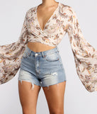With fun and flirty details, Boho Honey Tie Front Gauze Top shows off your unique style for a trendy outfit for the summer season!
