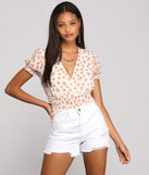 With fun and flirty details, Florals On The Mind Surplice Top shows off your unique style for a trendy outfit for the summer season!