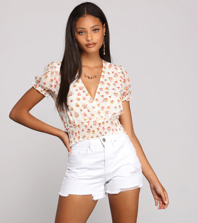 With fun and flirty details, Florals On The Mind Surplice Top shows off your unique style for a trendy outfit for the summer season!