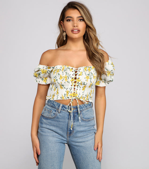 With fun and flirty details, Flirty Floral Lace-Up Crop Top shows off your unique style for a trendy outfit for the summer season!