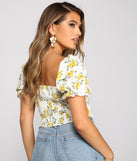 With fun and flirty details, Flirty Floral Lace-Up Crop Top shows off your unique style for a trendy outfit for the summer season!