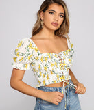 With fun and flirty details, Flirty Floral Lace-Up Crop Top shows off your unique style for a trendy outfit for the summer season!