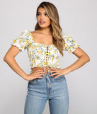 With fun and flirty details, Flirty Floral Lace-Up Crop Top shows off your unique style for a trendy outfit for the summer season!