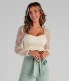 The trendy Sassy Sweetheart Mesh Crop Top is the perfect pick to create a holiday outfit, new years attire, cocktail outfit, or party look for any seasonal event!