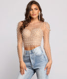 Rare Pearl Beauty Puff Sleeve Top creates the perfect New Year’s Eve Outfit or new years dress with stylish details in the latest trends to ring in 2023!