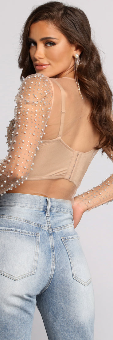 With fun and flirty details, Rare Pearl Beauty Puff Sleeve Top shows off your unique style for a trendy outfit for the summer season!